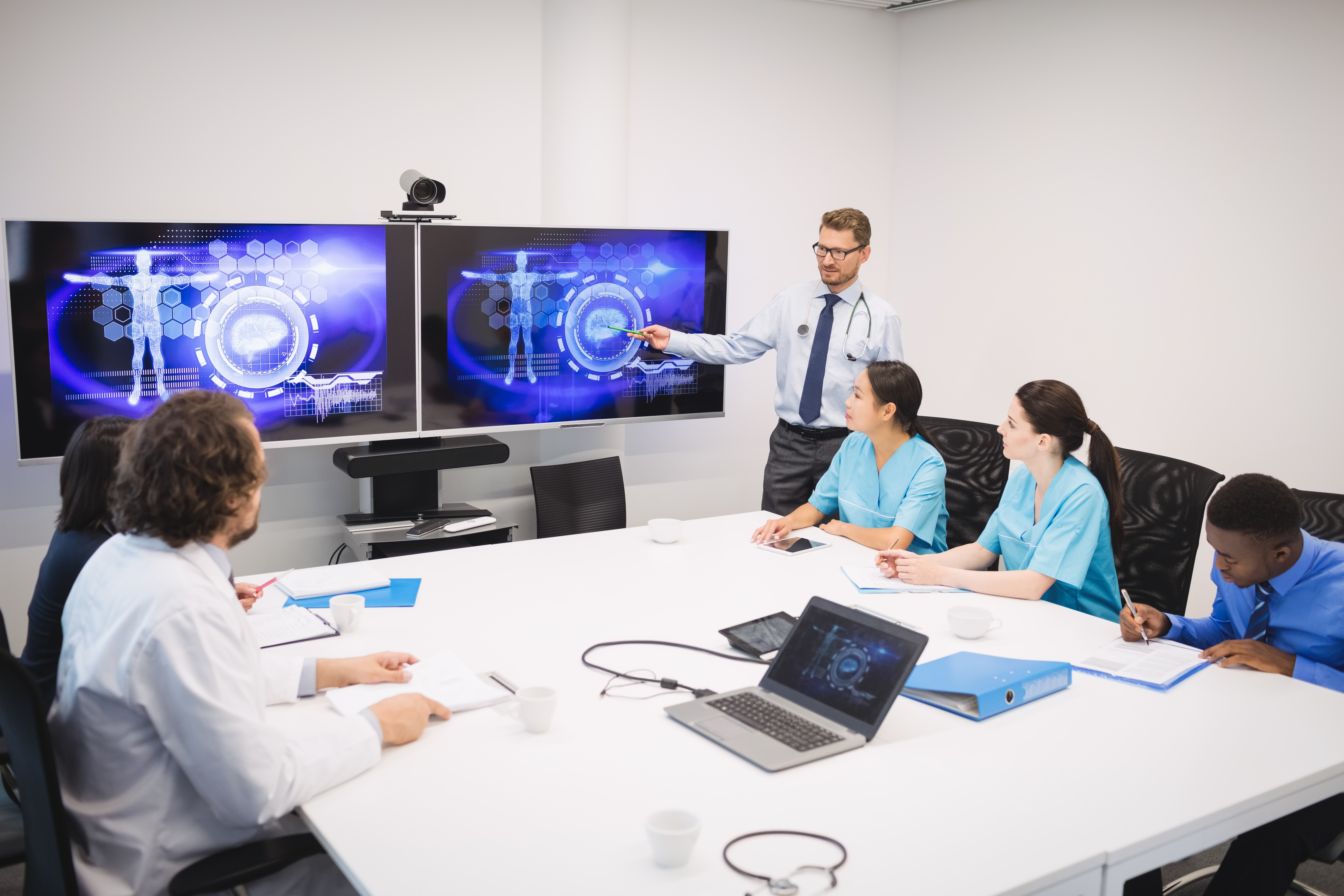 Healthcare team reviewing compliance strategy
